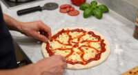 Little Caesars’ New ‘Webbed Pizza’ Comes With Something Special for Spider-Man Fans